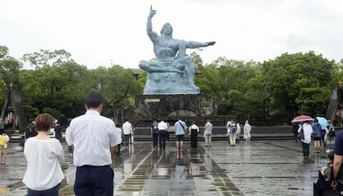 Japan scales back Nagasaki memorial amid storm