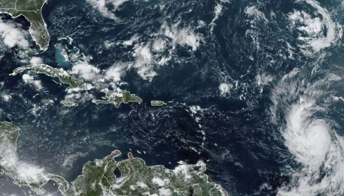 Tropical Storm Lee strengthens into hurricane, churns across Atlantic toward Caribbean