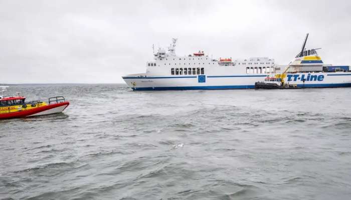 Grounded ferry off Swedish coast remains adrift, leaking oil