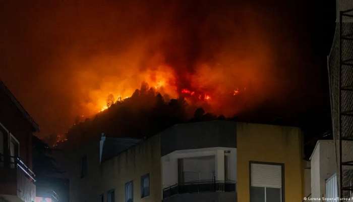 Spain evacuates hundreds over wildfire, strong winds