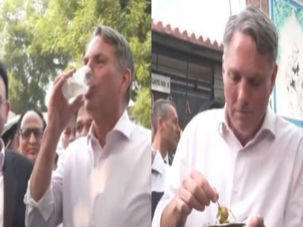 Australian Dy PM Marles drinks 'nimbu pani', eats 'Ram laddu' at street stall in Delhi, pays through UPI