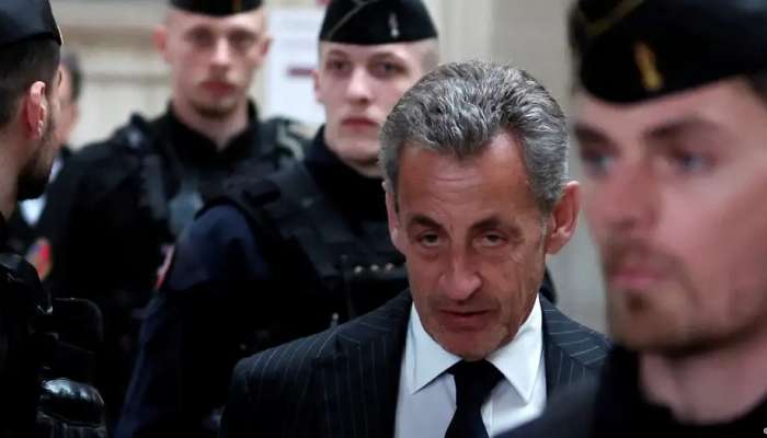 French court confirms Sarkozy guilty verdict, cuts sentence