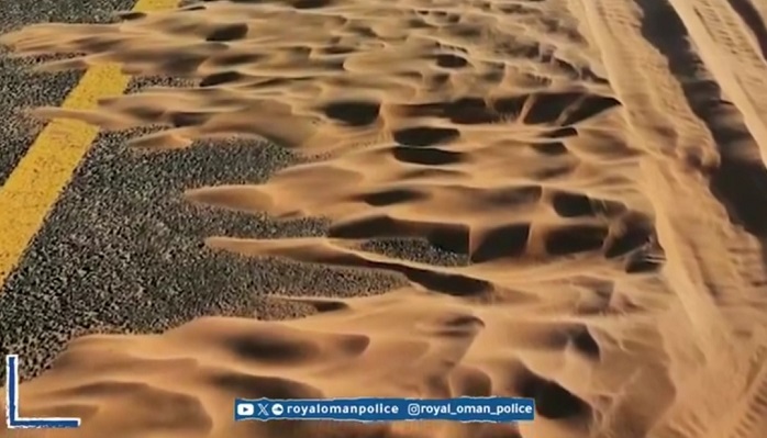 Royal Oman Police warns of sand dunes on this road