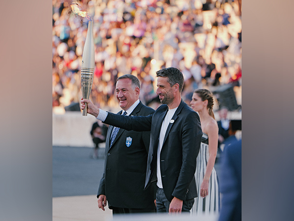 Greece hands over Olympic flame to Paris 2024 Games organisers during ceremony in Athens