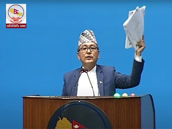 Nepali lawmaker tears "Budget Booklet" on rostrum of parliament protesting uneven distribution of budgetary funds